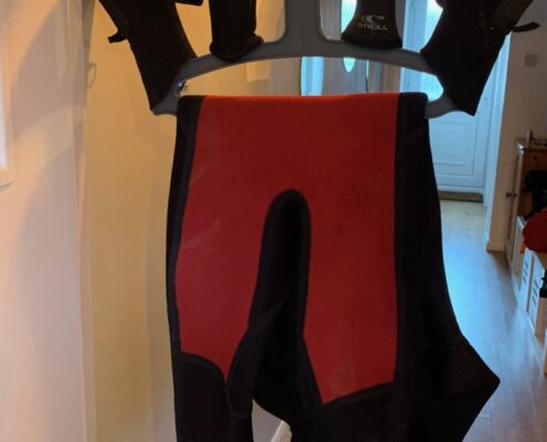 c-monsta wetsuit hangar with wetsuit boots and gloves